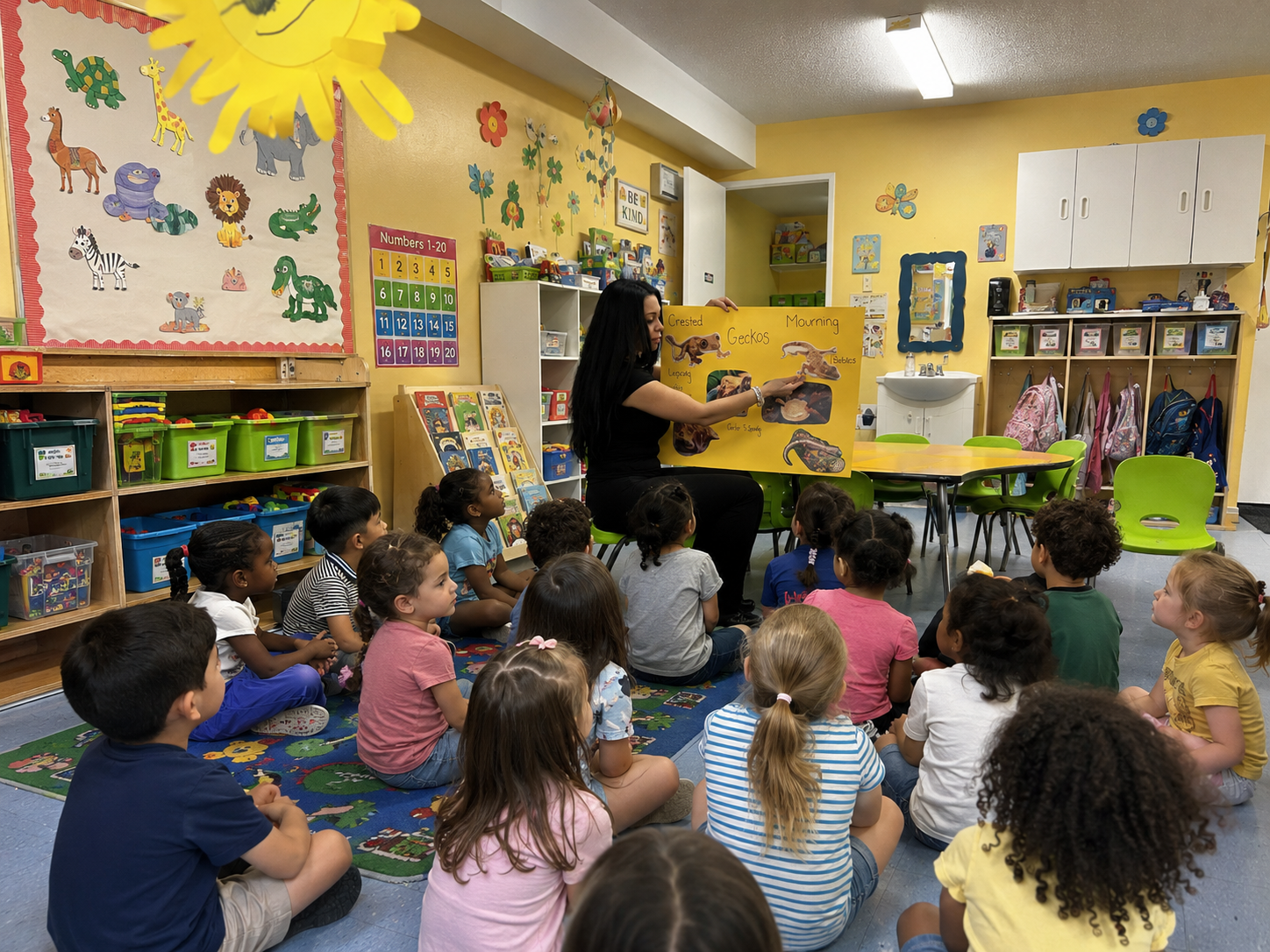 A Little Explorers reptile educator guiding a classroom lesson about mourning geckos